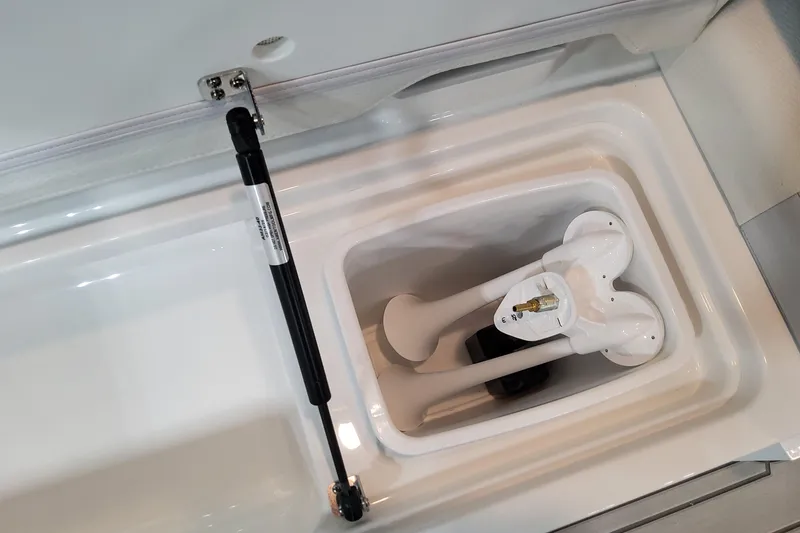 Slide: The Image of Storage compartment in 2026 Formula 330 Crossover Bowrider OB boat. - 64