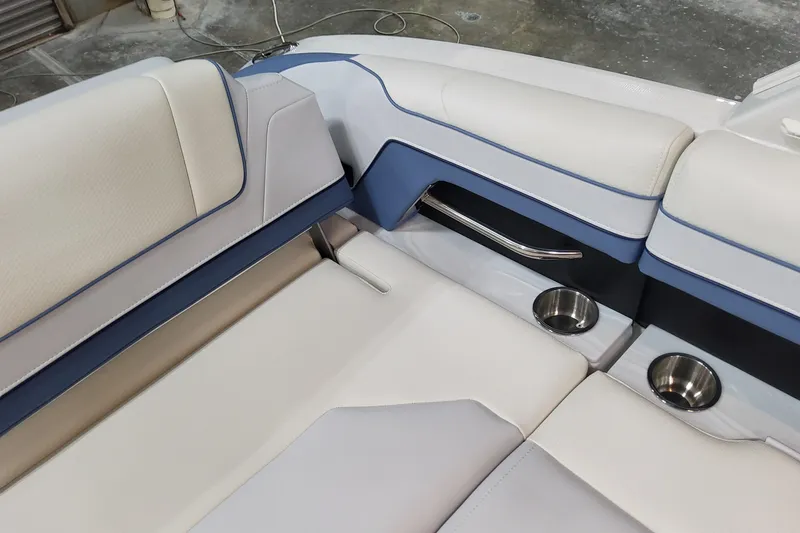 Slide: The Image of Luxurious seating on 2026 Formula 330 Crossover Bowrider OB with cup holders and sleek design. - 66