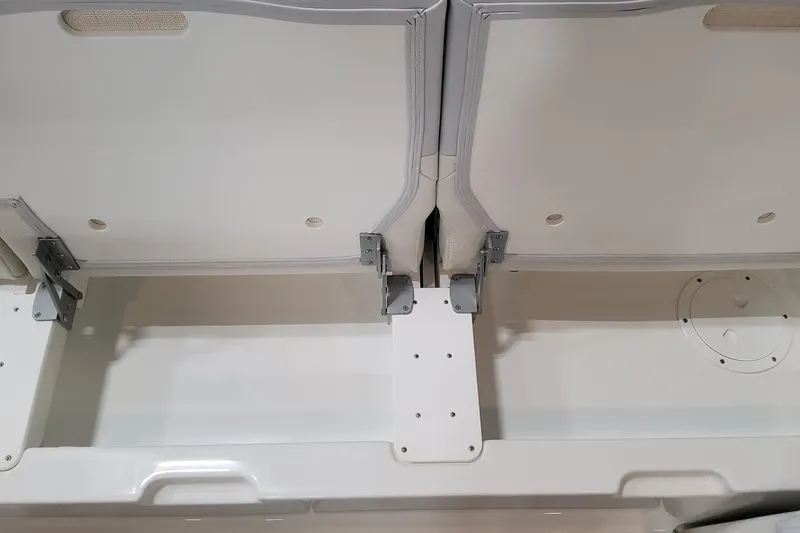 Slide: The Image of 2026 Formula 330 Crossover Bowrider OB storage compartment with open hatch and hinges. - 69