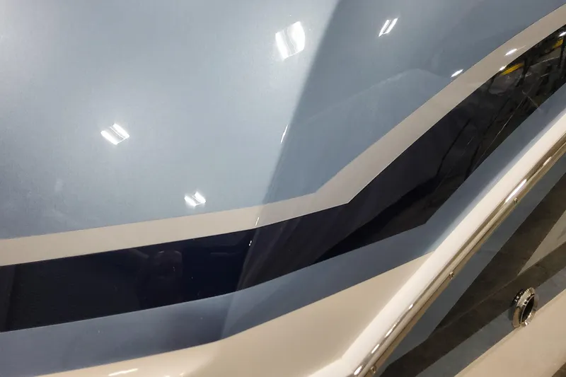 Slide: The Image of Close-up of 2026 Formula 330 Crossover Bowrider OB boat hull design. - 7
