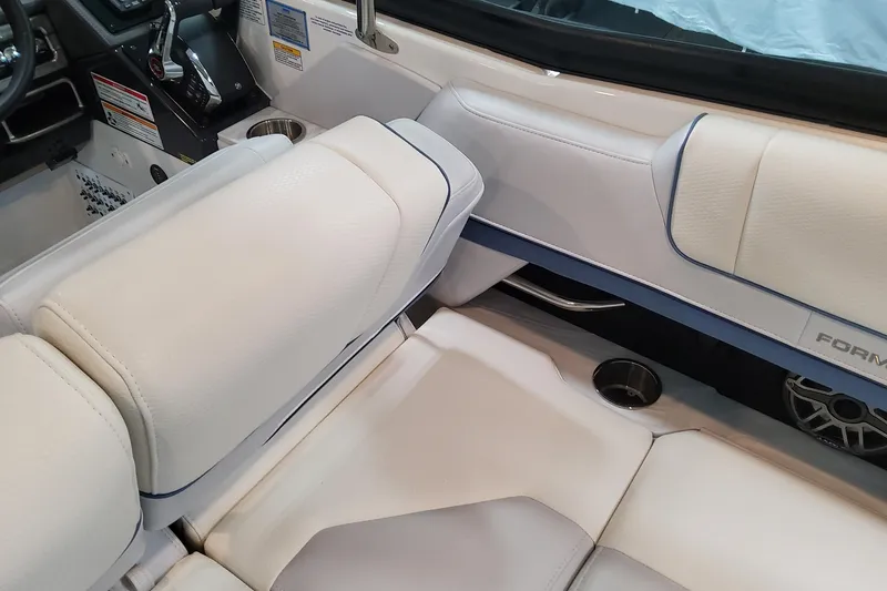 Slide: The Image of Luxurious interior of 2026 Formula 330 Crossover Bowrider OB with plush seating and modern controls. - 74