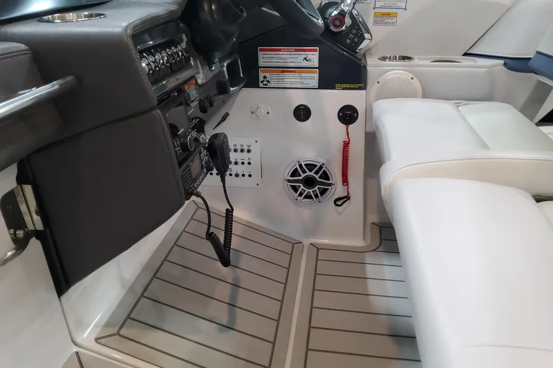 Slide: The Image of 2026 Formula 330 Crossover Bowrider OB cockpit with modern controls and seating. - 84