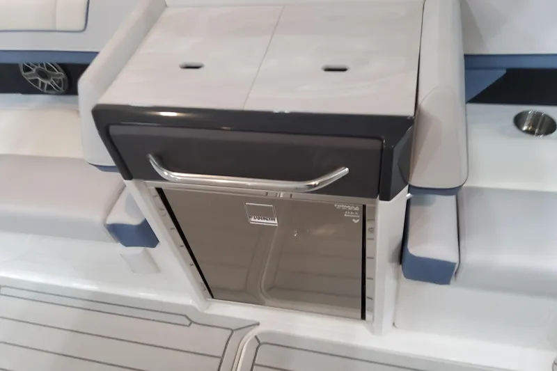 Slide: The Image of 2026 Formula 330 Crossover Bowrider OB interior with sleek seating and modern amenities. - 85