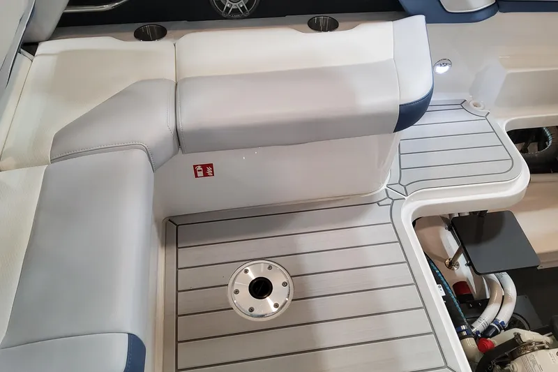 Slide: The Image of 2026 Formula 330 Crossover Bowrider OB interior with sleek seating and modern flooring. - 90