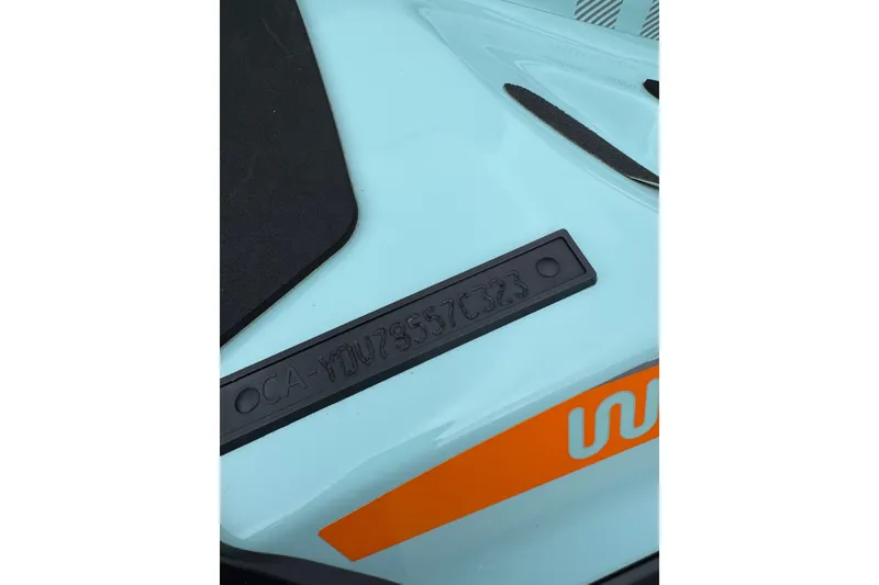 Slide: The Image of 2024 Sea Doo Wake 170 close-up showing hull details and identification number. - 4