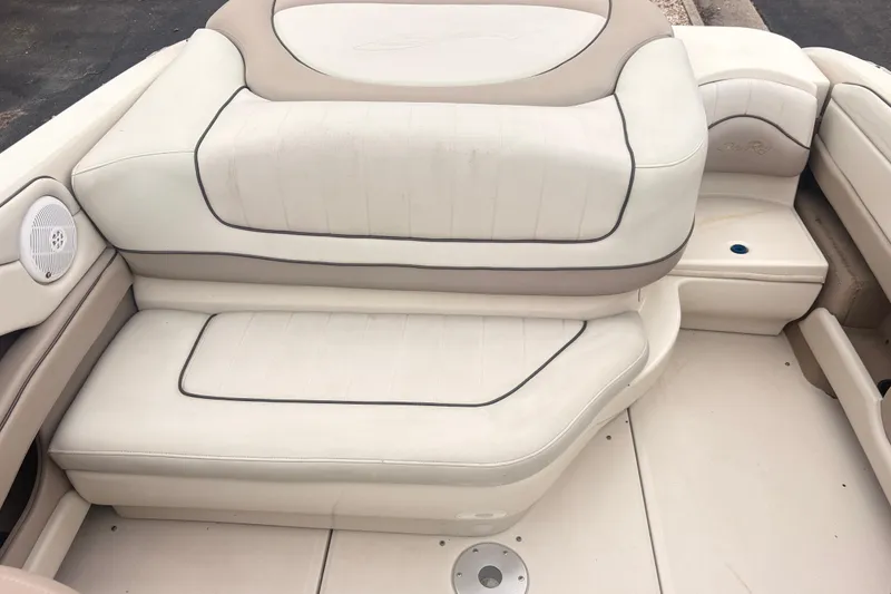 Slide: The Image of Cream and beige seating on a 2003 Sea Ray 240 Bow Rider boat. - 7