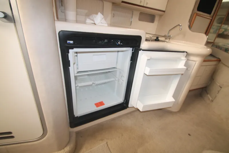 Slide: The Image of Open refrigerator in 1996 Sea Ray Sundancer 330 yacht kitchen interior. - 18