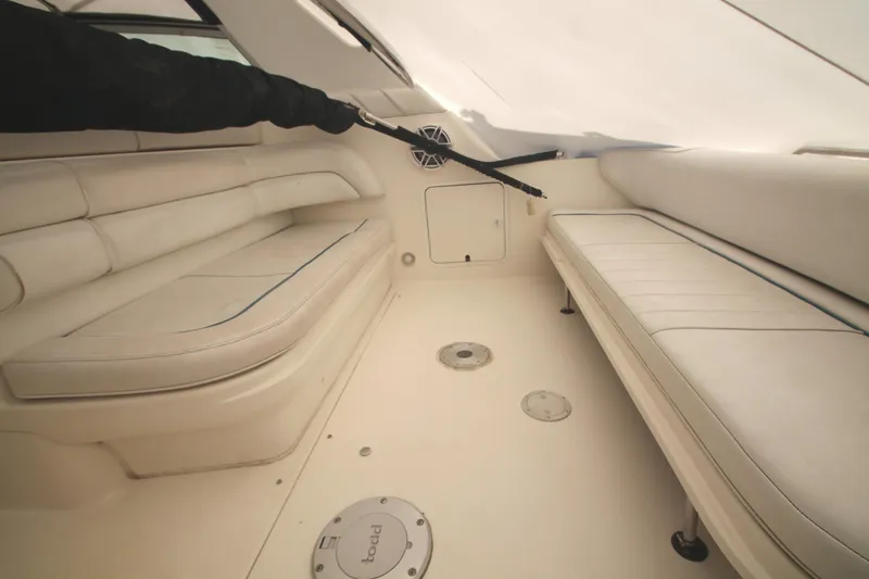 Slide: The Image of Interior seating area of a 1996 Sea Ray Sundancer 330 boat. - 28