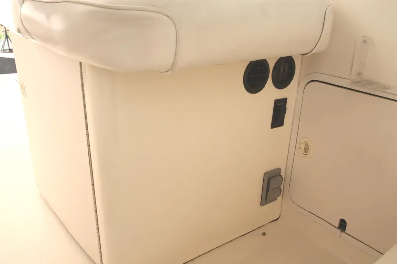 Slide: The Image of Interior detail of a 1996 Sea Ray Sundancer 330 boat, featuring seating and ventilation. - 35