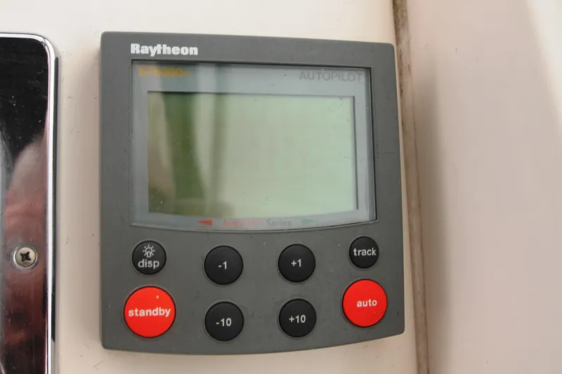 Slide: The Image of Raytheon autopilot control panel on 1996 Sea Ray Sundancer 330 boat. - 40