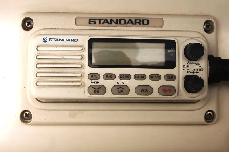 Slide: The Image of Standard marine radio on 1996 Sea Ray Sundancer 330 boat dashboard. - 42