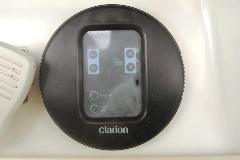 Slide: The Image of Clarion audio control panel on 1996 Sea Ray Sundancer 330 boat. - 45