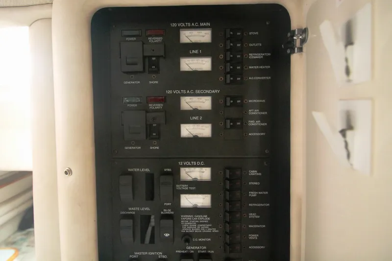 Slide: The Image of Electrical control panel on a 1996 Sea Ray Sundancer 330 boat. - 50
