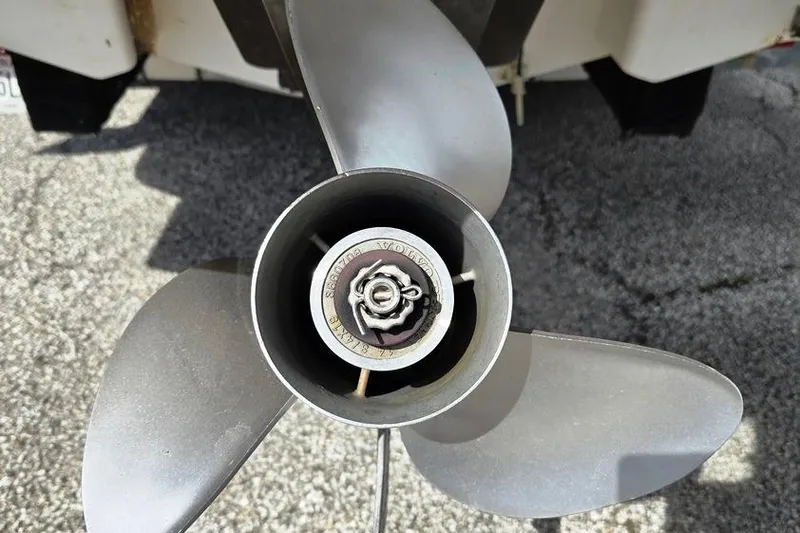 Slide: The Image of Propeller of 2005 Chaparral Sunesta 254 boat on concrete surface. - 11