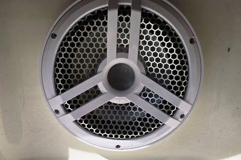 Slide: The Image of Close-up of a speaker grille on a 2005 Chaparral Sunesta 254 boat. - 19