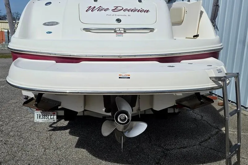 Slide: The Image of 2005 Chaparral Sunesta 254 boat rear view with propeller and Indiana license plate. - 8