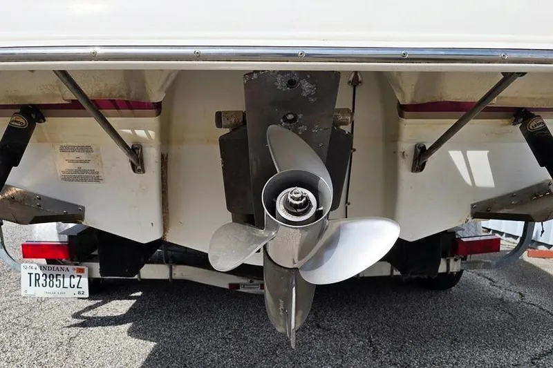 Slide: The Image of Rear view of 2005 Chaparral Sunesta 254 boat with visible propeller and Indiana license plate. - 9