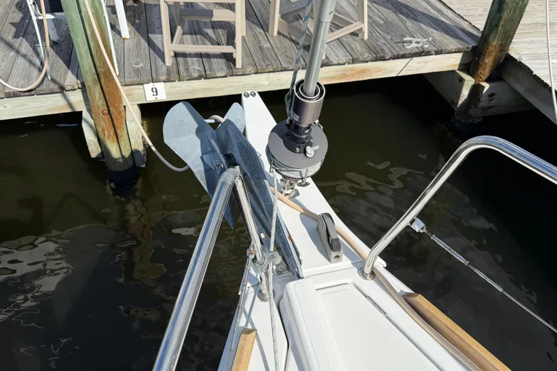 Slide: The Image of Bow of 2015 Jeanneau Sun Odyssey 349 sailboat docked at marina. - 16