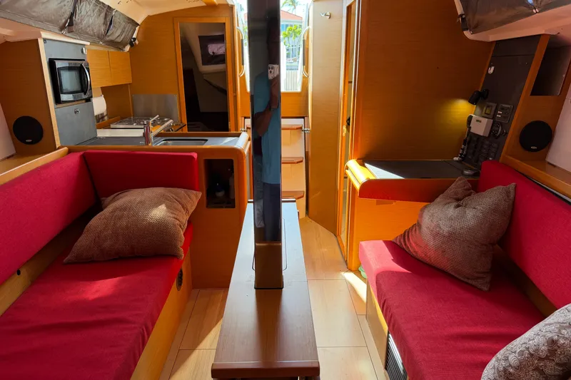 Slide: The Image of Interior of 2015 Jeanneau Sun Odyssey 349 sailboat with cozy seating and modern kitchen. - 20