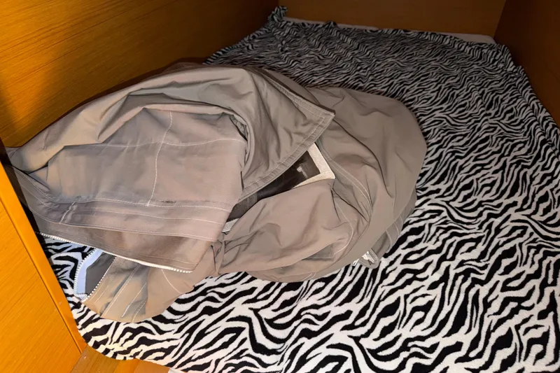 Slide: The Image of Folded sail on zebra-patterned bed inside 2015 Jeanneau Sun Odyssey 349 yacht cabin. - 30