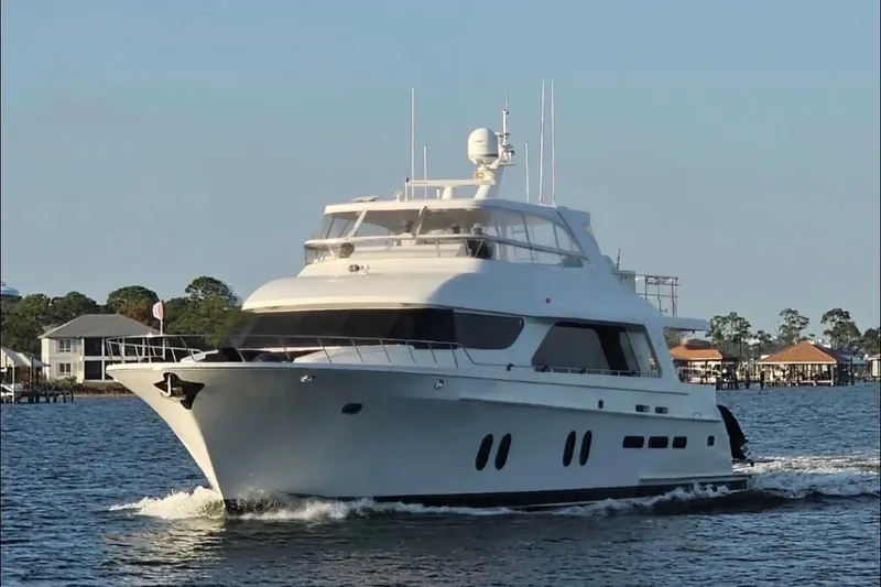 The Image of 2018 Cheoy Lee Bravo 78 Sport Motor Yacht cruising on a sunny day. - 1