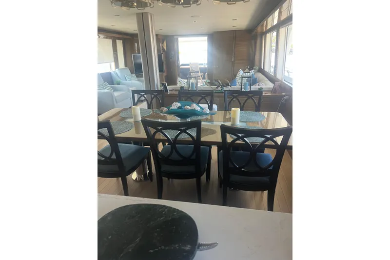 Slide: The Image of Luxurious interior of 2018 Cheoy Lee Bravo 78 Sport Motor Yacht dining area. - 12