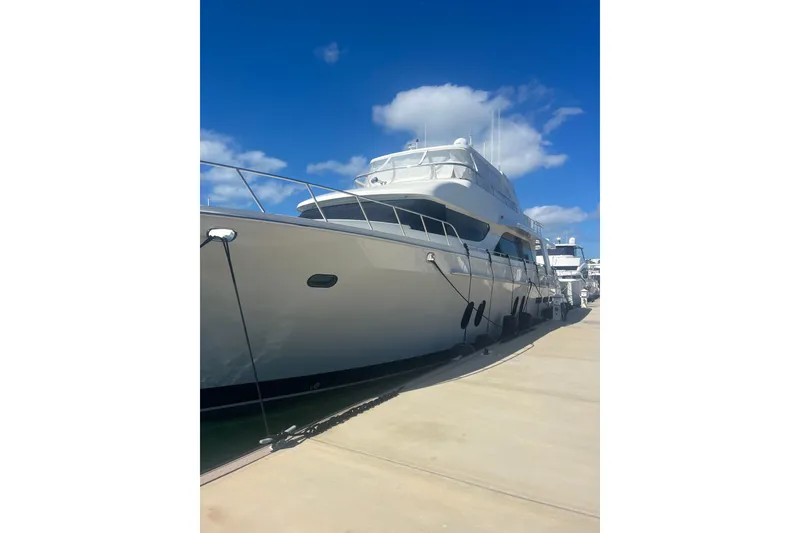 Slide: The Image of 2018 Cheoy Lee Bravo 78 Sport Motor Yacht docked under blue sky. - 3