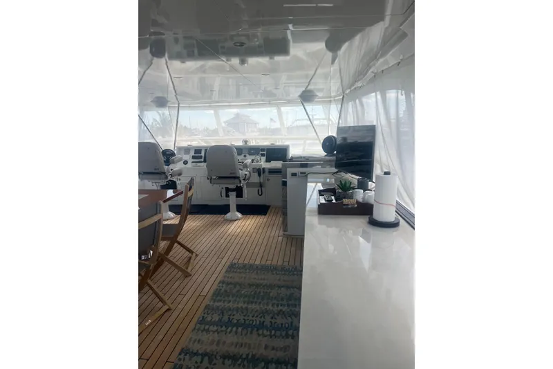Slide: The Image of Interior of 2018 Cheoy Lee Bravo 78 Sport Motor Yacht with modern helm and seating. - 6