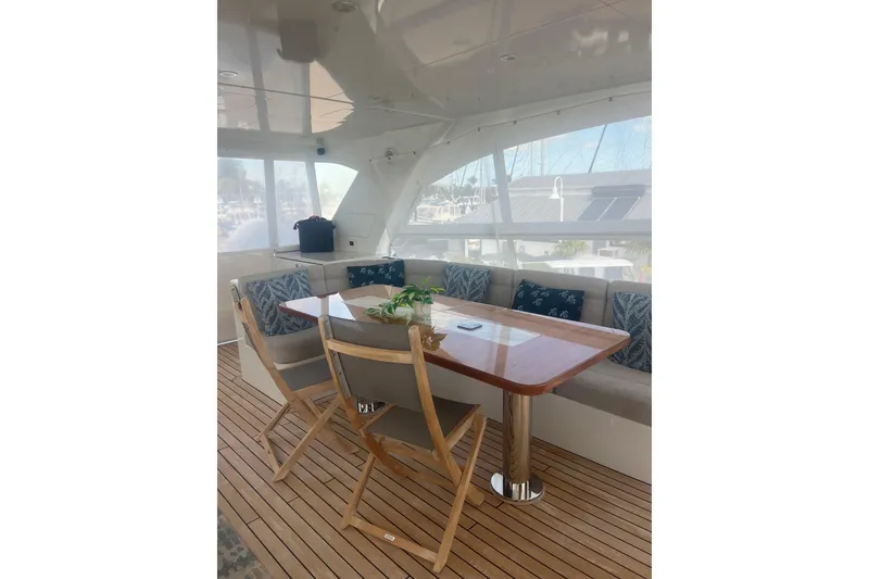 Slide: The Image of Luxurious interior of 2018 Cheoy Lee Bravo 78 Sport Motor Yacht with elegant seating and table. - 7