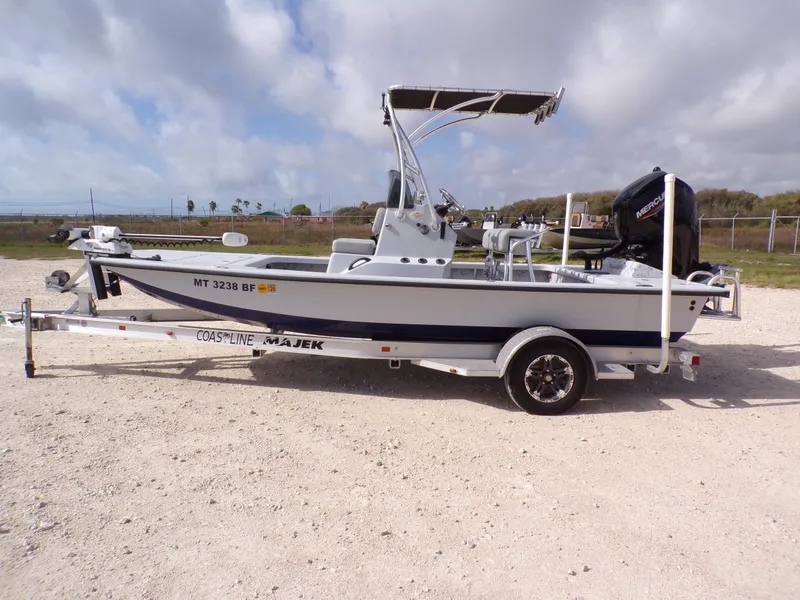 The Image of 2022 Majek 18 Illusion M2 boat on trailer, side view. - 1