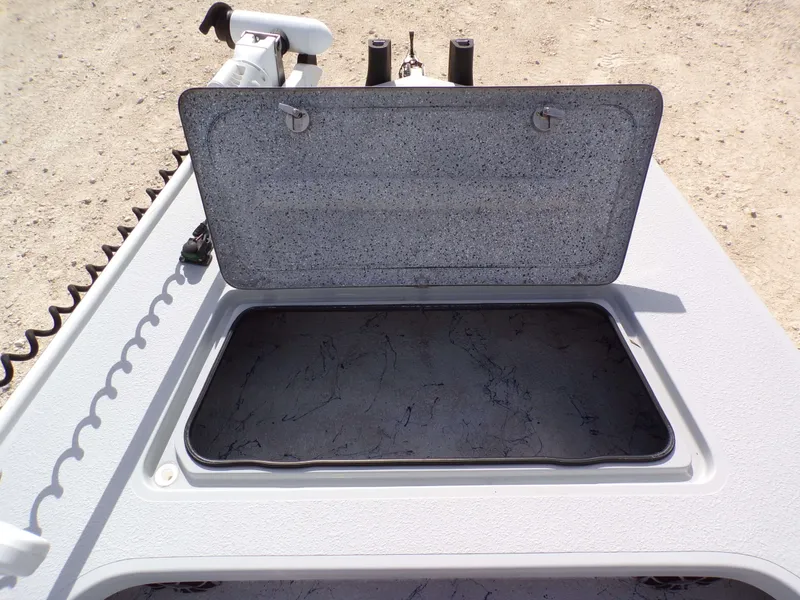 Slide: The Image of Open storage compartment on Majek 18 Illusion M2 boat, 2022 model. - 10