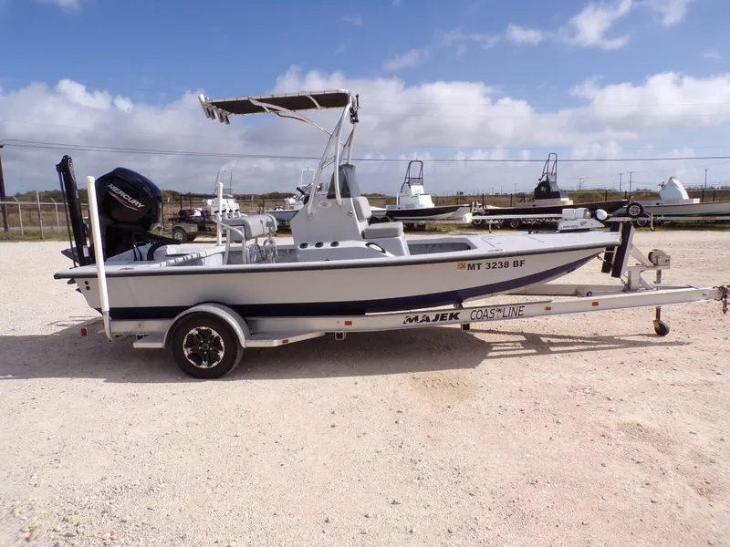 Slide: The Image of 2022 Majek 18 Illusion M2 boat on trailer, side view. - 16
