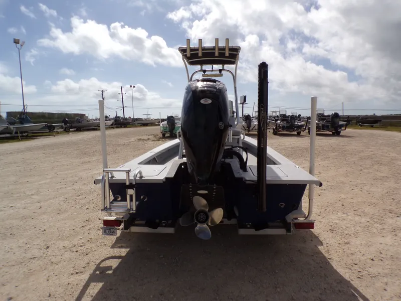 Slide: The Image of Rear view of a 2022 Majek 18 Illusion M2 boat on a trailer. - 17