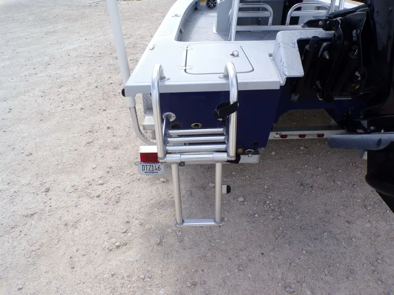 Slide: The Image of 2022 Majek 18 Illusion M2 boat with ladder on sand. - 32