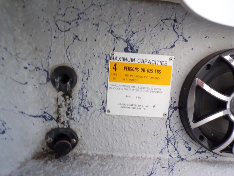 Slide: The Image of Majek 18 Illusion M2 2022 boat capacity label and speaker. - 33