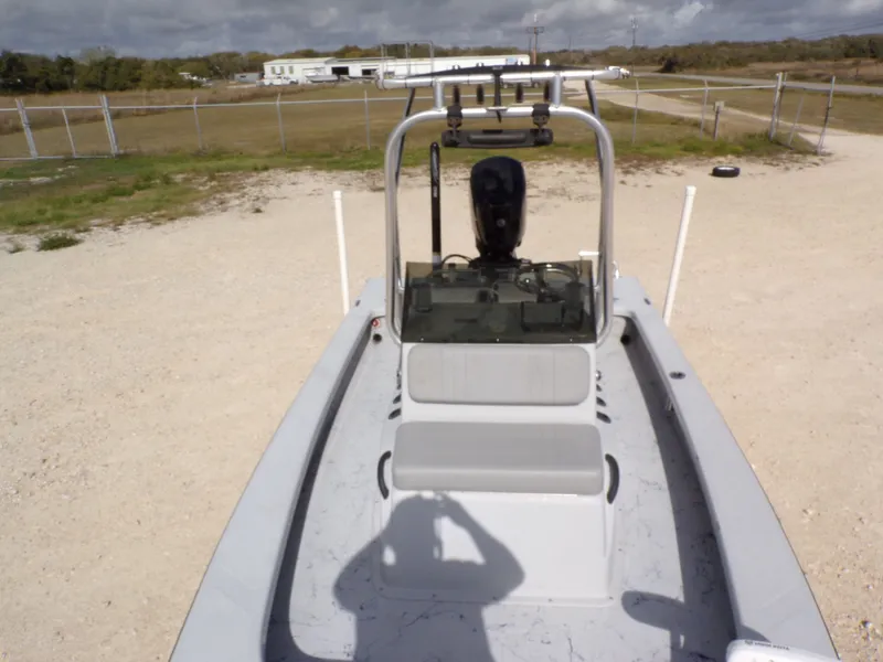 Slide: The Image of Majek 18 Illusion M2 boat, 2022 model, on a parking lot. - 6