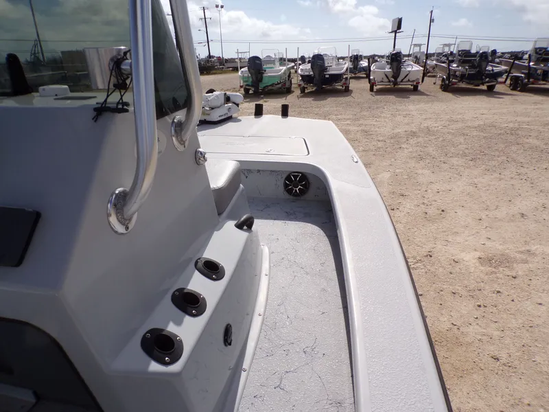 Slide: The Image of 2022 Majek 18 Illusion M2 boat in a parking lot. - 9