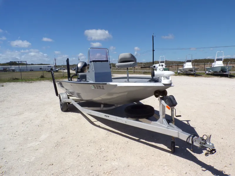 Slide: The Image of 2021 Xpress H190B Bay boat on trailer in sunny weather. - 12