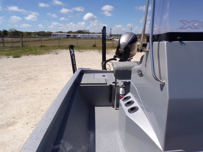 Slide: The Image of 2021 Xpress H190B Bay boat with outboard motor. - 18