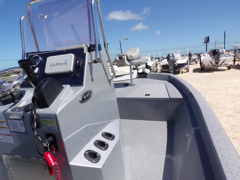Slide: The Image of 2021 Xpress H190B Bay boat with Garmin system, parked outdoors. - 22