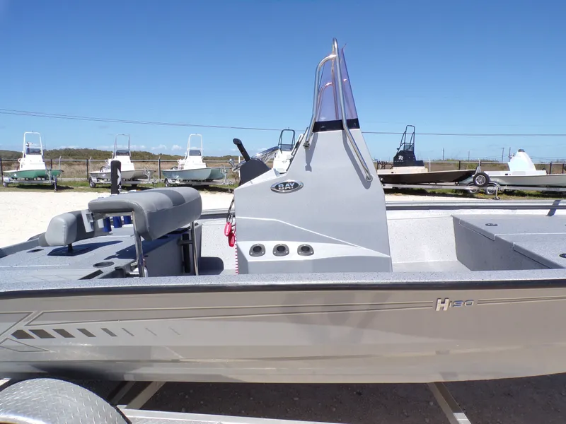 Slide: The Image of 2021 Xpress H190B Bay boat on a trailer outdoors. - 28