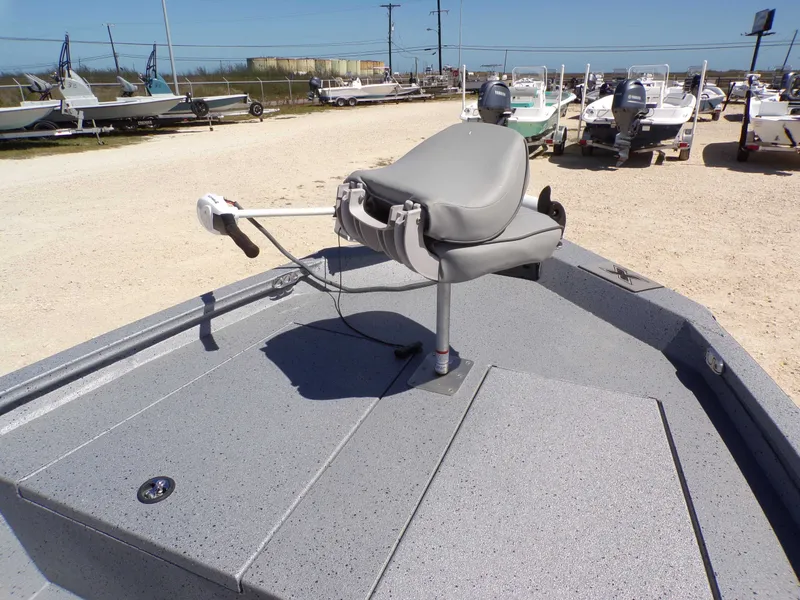 Slide: The Image of 2021 Xpress H190B Bay boat with gray seat and controls. - 5