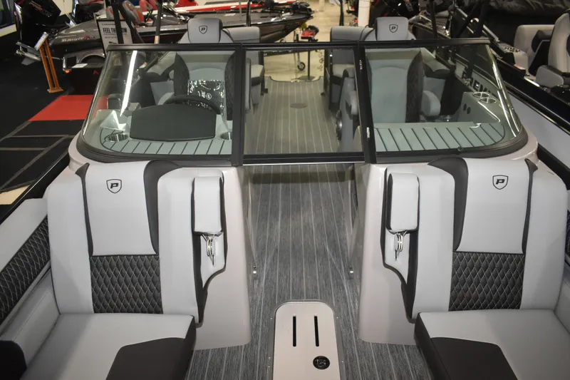 Slide: The Image of Interior view of 2026 Premier 250 Solaris Sport boat, featuring sleek seating and modern design. - 16