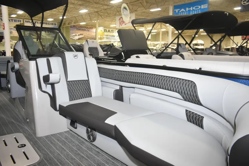 Slide: The Image of 2026 Premier 250 Solaris Sport boat interior with luxurious seating and modern design. - 18