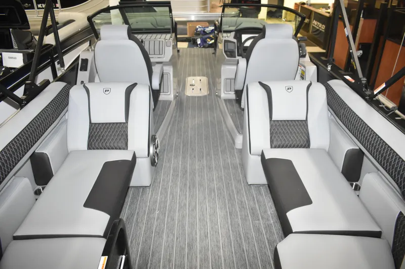 Slide: The Image of Interior of 2026 Premier 250 Solaris Sport boat with luxurious seating and modern design. - 4