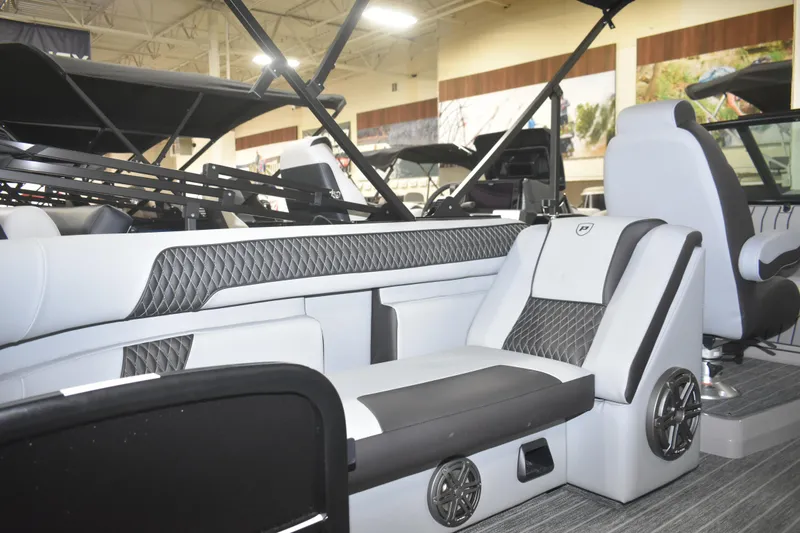 Slide: The Image of Interior of 2026 Premier 250 Solaris Sport boat with luxurious seating and modern design. - 6