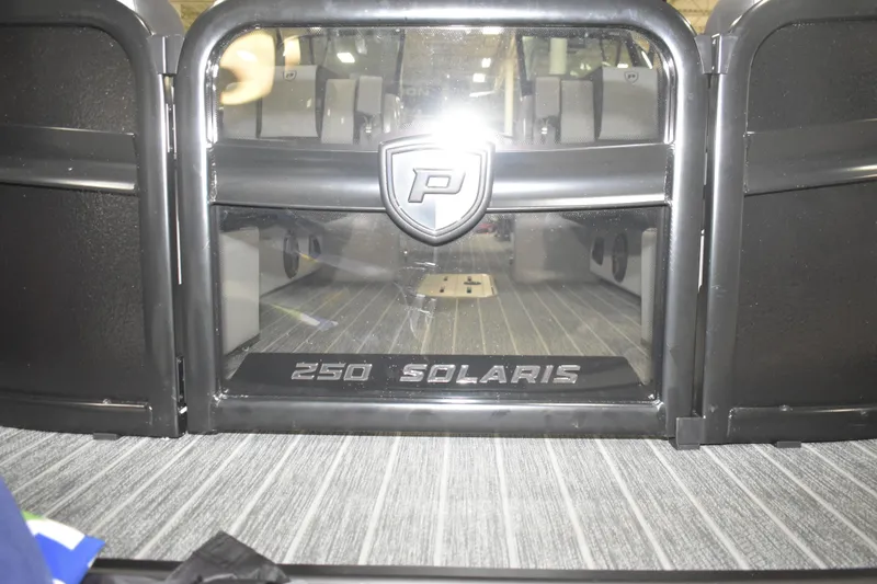 Slide: The Image of 2026 Premier 250 Solaris Sport boat interior with logo and model name. - 8