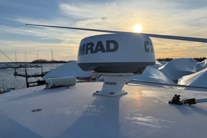 Slide: The Image of Radar equipment on a 2002 Seaswirl Striper 2301 Walkaround O/B at sunset by the marina. - 7