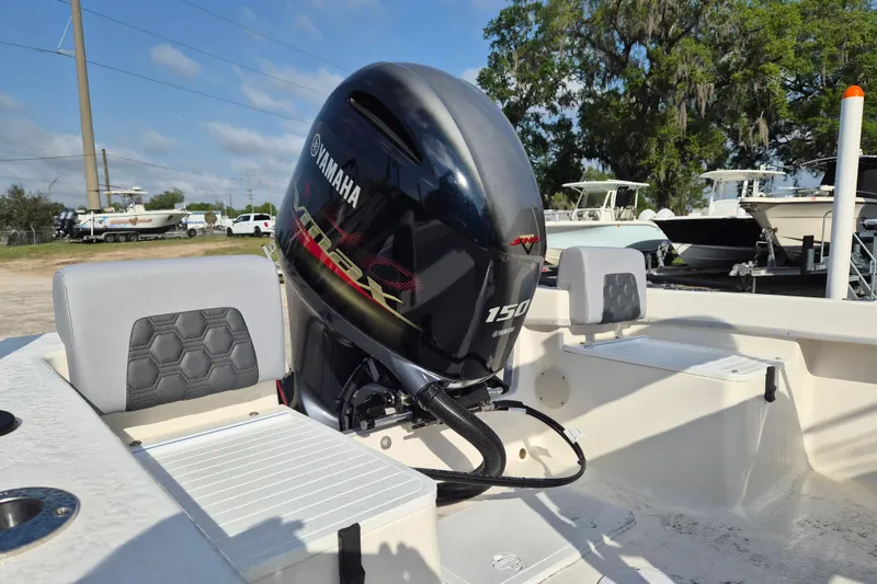 Slide: The Image of 2026 May-Craft 208 CC boat with Yamaha 150 engine, outdoor setting. - 3