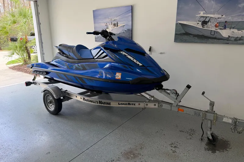 Slide: The Image of 2023 Yamaha WaveRunner GP1800R SVHO on trailer in garage setting. - 2